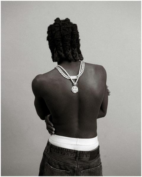 Black and white artistic portrait of a man with a