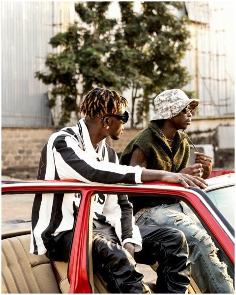 Stylish young men in Lagos, Nigeria, enjoying an u