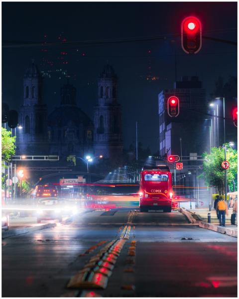 Long exposure shot of illuminated city streets in