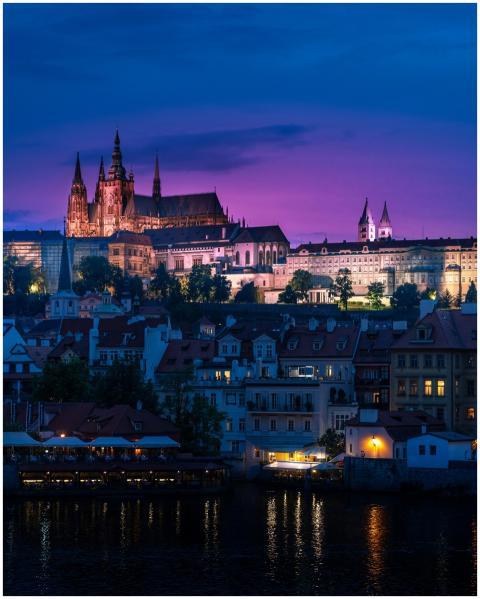 Twilight view of Prague Castle reflected in the Vl