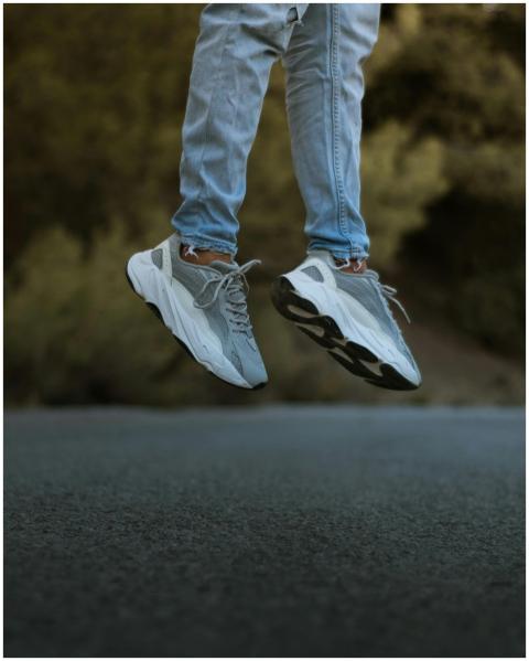 Dynamic image capturing sneakers suspended mid-air