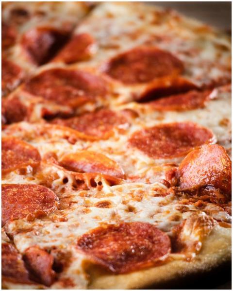 Mouthwatering pepperoni pizza with melting cheese