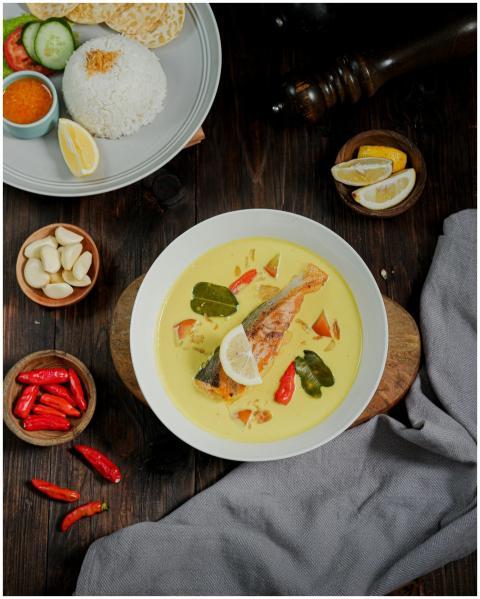 Delicious fish curry with aromatic spices and rice