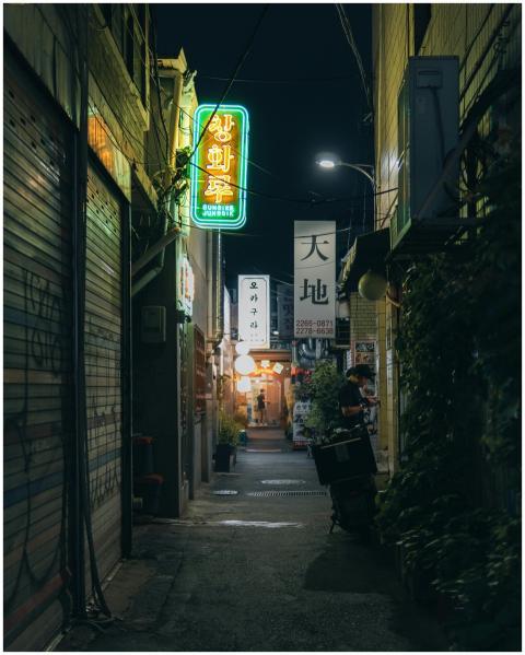 Explore Seoul's lively alleys at night, adorned wi