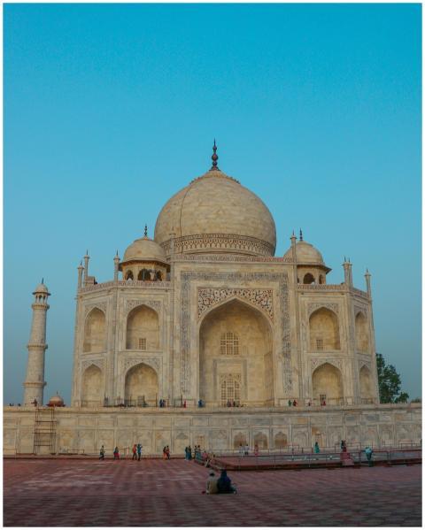 Ancient stone Taj Mahal with dome and fence locate