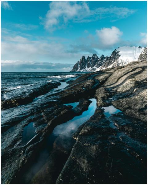 Majestic view of snow-capped mountains and rocky s