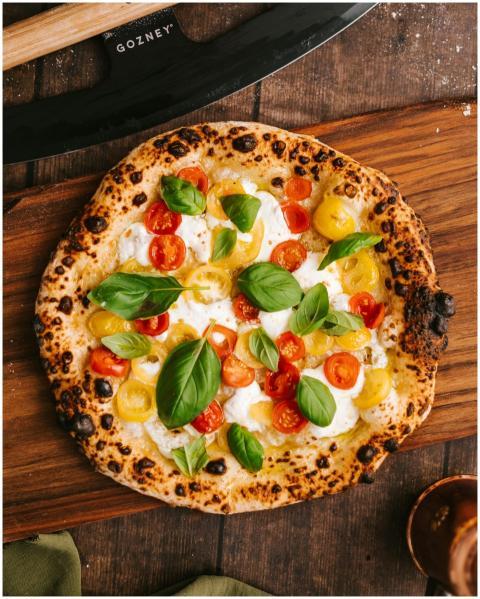 Top view of a delicious Neapolitan pizza with vibr