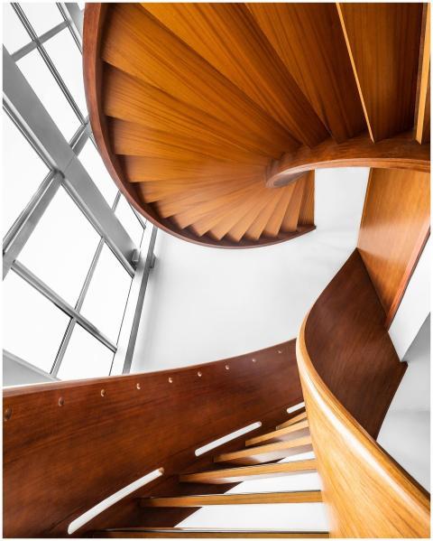 Beautiful wooden spiral staircase with modern desi
