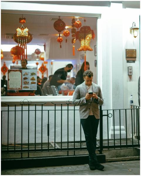 Man Outside Asian Restaurant