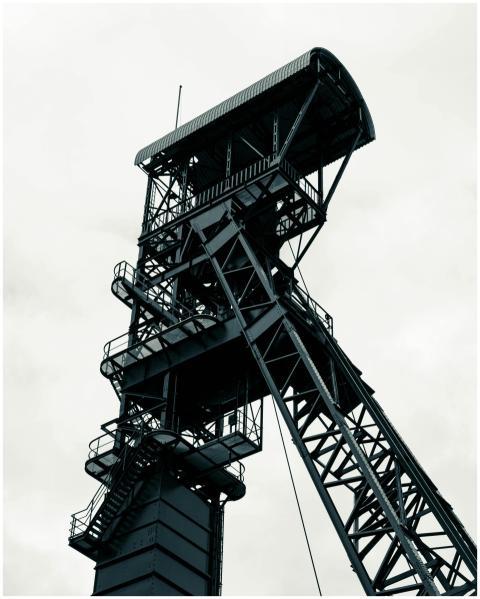 Dramatic view of a towering industrial framework a