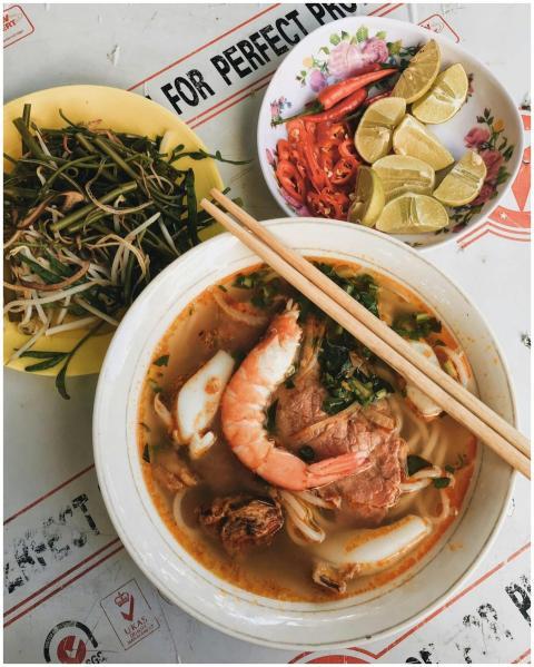 Delicious Vietnamese noodle soup with shrimp and f
