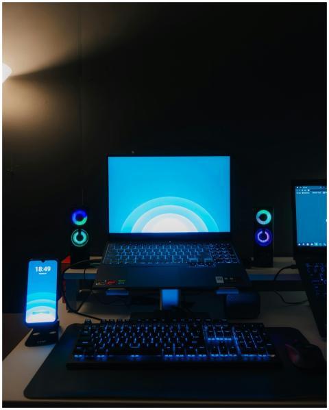 A sleek, technology-focused workspace featuring a