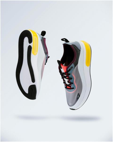 Floating modern sneakers showcasing trendy design