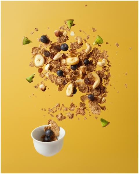 A vibrant explosion of cereal, nuts, and fruits ag