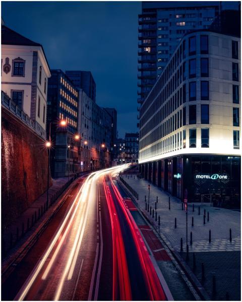 Dynamic long exposure shot of a bustling Warsaw st