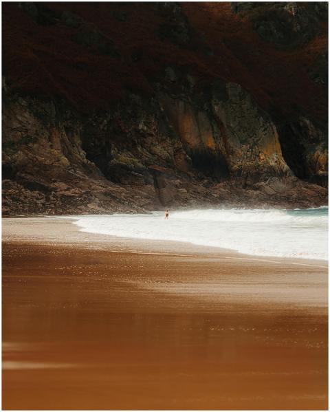 Tranquil scene at Jersey beach featuring waves and