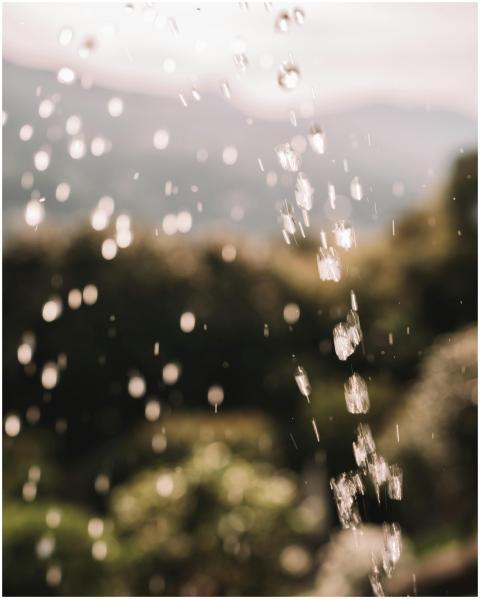 Captivating shot of water droplets falling with a