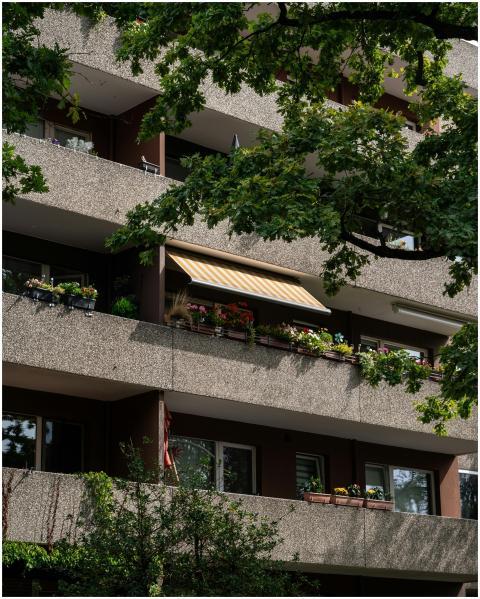 Modern residential building with balconies adorned