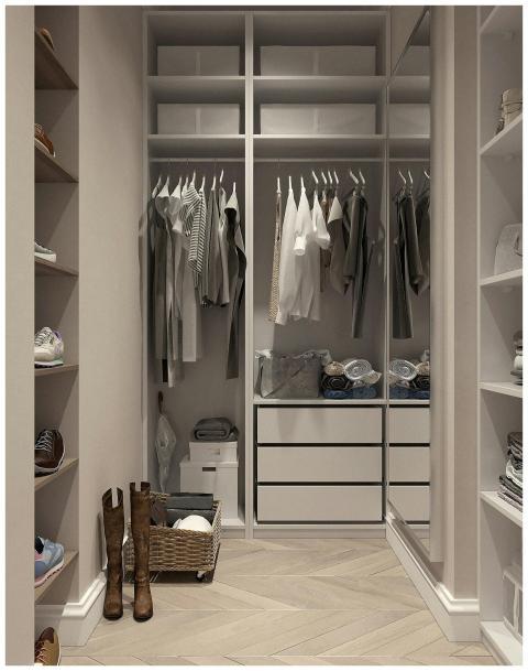 Stylish walk-in closet with neutral tones and cont