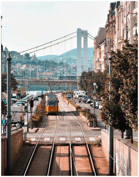Tram moving towards Erzsébet Bridge in Budapest wi