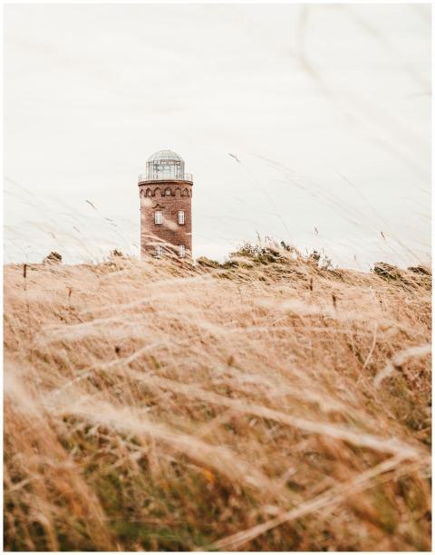 A picturesque lighthouse tower set against a beaut
