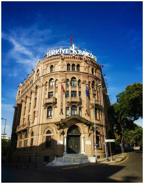 Historic Türkiye İş Bankası building in a vibrant