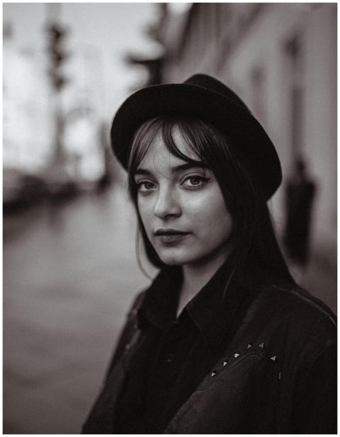 Elegant black and white portrait of a woman with v