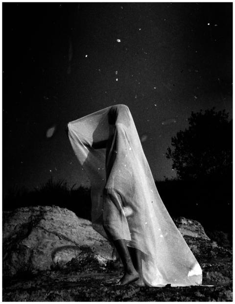 A captivating black and white photo of a person co