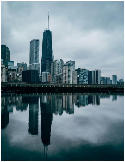 Scenic view of Chicago skyline mirrored in a calm