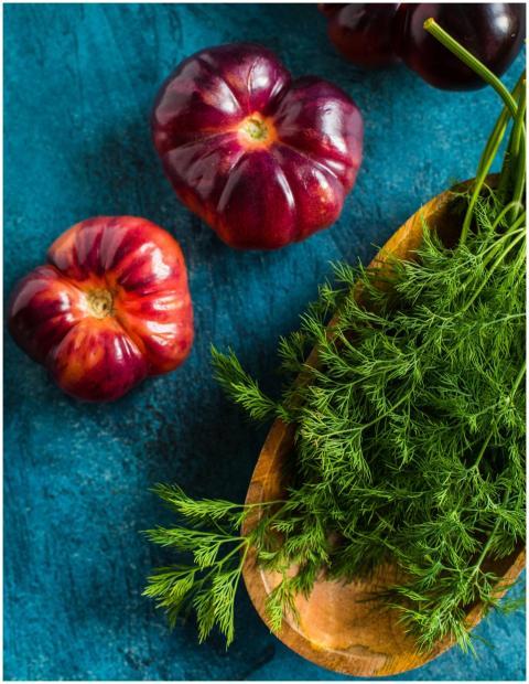 Close-up of fresh organic heirloom tomatoes and di