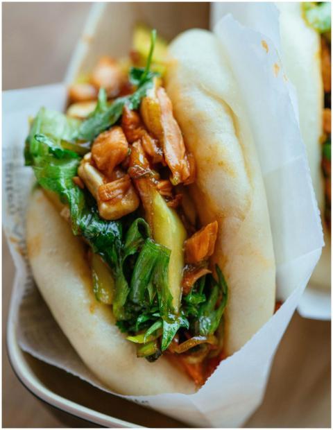 Close-up of delicious Asian bao buns filled with m