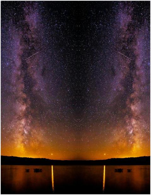 Breathtaking view of the Milky Way galaxy reflecti