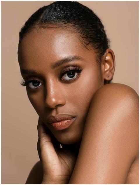 Stunning close-up portrait of a black woman with e