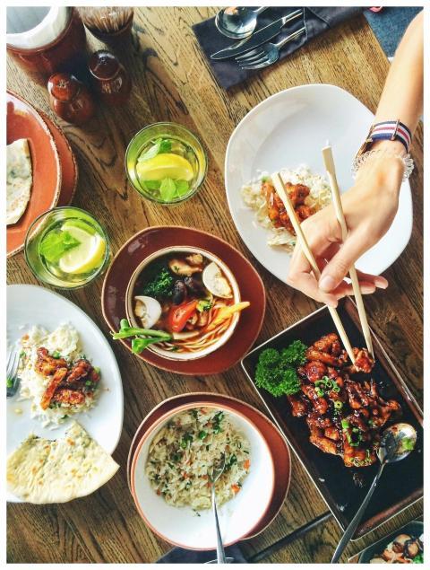 A vibrant display of Asian cuisine with chopsticks