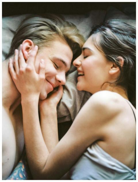 A joyful and intimate moment of a young couple emb