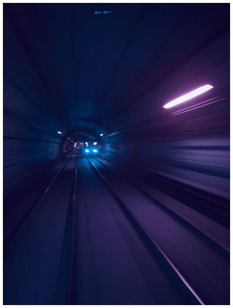Dynamic view of a subway train speeding through a