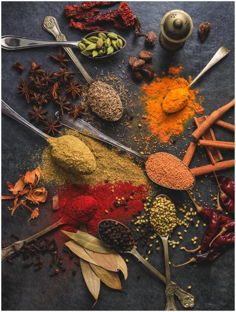 Vibrant array of spices including turmeric, cumin,