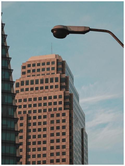 Low angle view of modern high-rise building facade