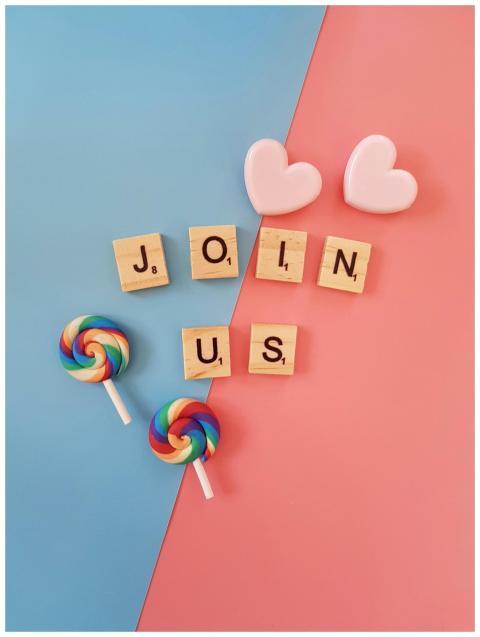 Bright 'Join Us' call-to-action with colorful loll
