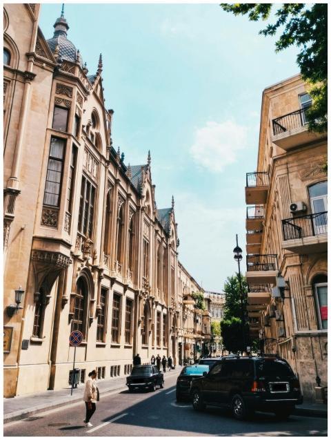 A bustling street in Baku, Azerbaijan featuring hi