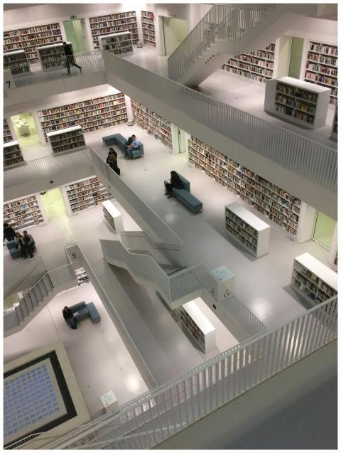 A multi-level library interior with modern archite
