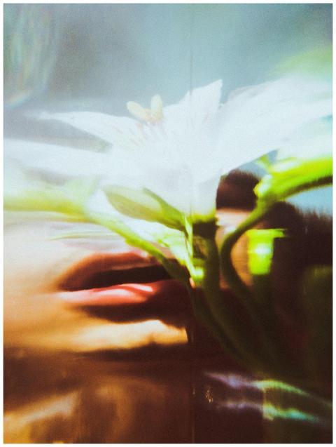 A vibrant abstract photo featuring a blurry white