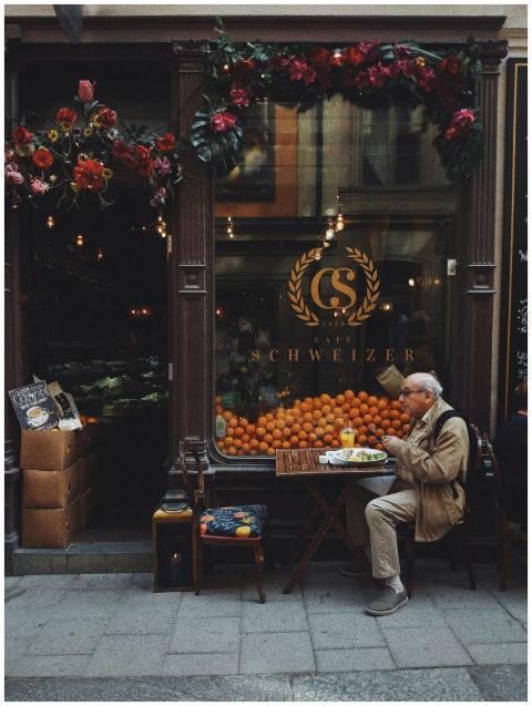 A picturesque street café in Stockholm featuring a