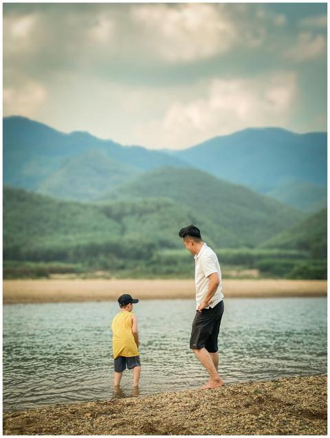 Father Son Tranquil Lake
