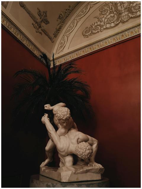 A classic marble sculpture showcased in an ornate