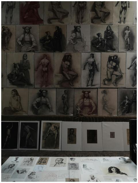 Detailed sketches and artworks displayed in a Sain