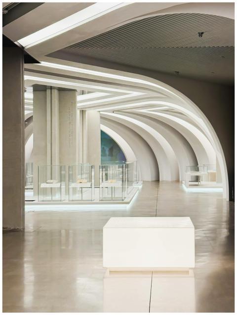 Sleek, modern design with illuminated arches in a