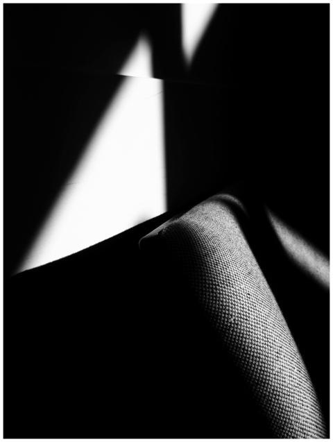 Explore high contrast shadows on fabric in this ca
