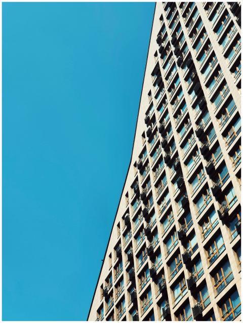 An impressive skyscraper in Kyiv with glass window