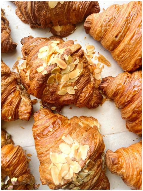 Tempting almond-topped croissants showcasing golde